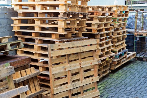 Low-carbon van delivering a skip in Kenton